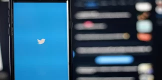 Como denunciar um utilizador em Espaços Twitter